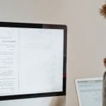 man assesses marketing performance Akita is a Dynamics 365 customer insights partner UK