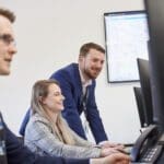 Akita's approach to CRM Akita CRM consultants working together