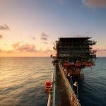 oil rig at sunrise dynamics 365 for oil and gas