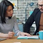 Consultants reviewing CRM and ERP system Arrange a dynamics 365 health check for your CRM or ERP systm