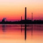 oil and gas works at sunset Akita crafts Dynamics 365 oil & gas solutions and systems