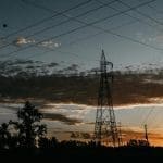 telecoms and connectivity Phone lines in front of sunset