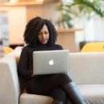 Woman workng on a laptop